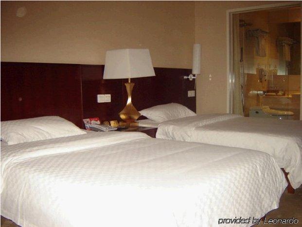 Bluesky Hotel Canton Chambre photo